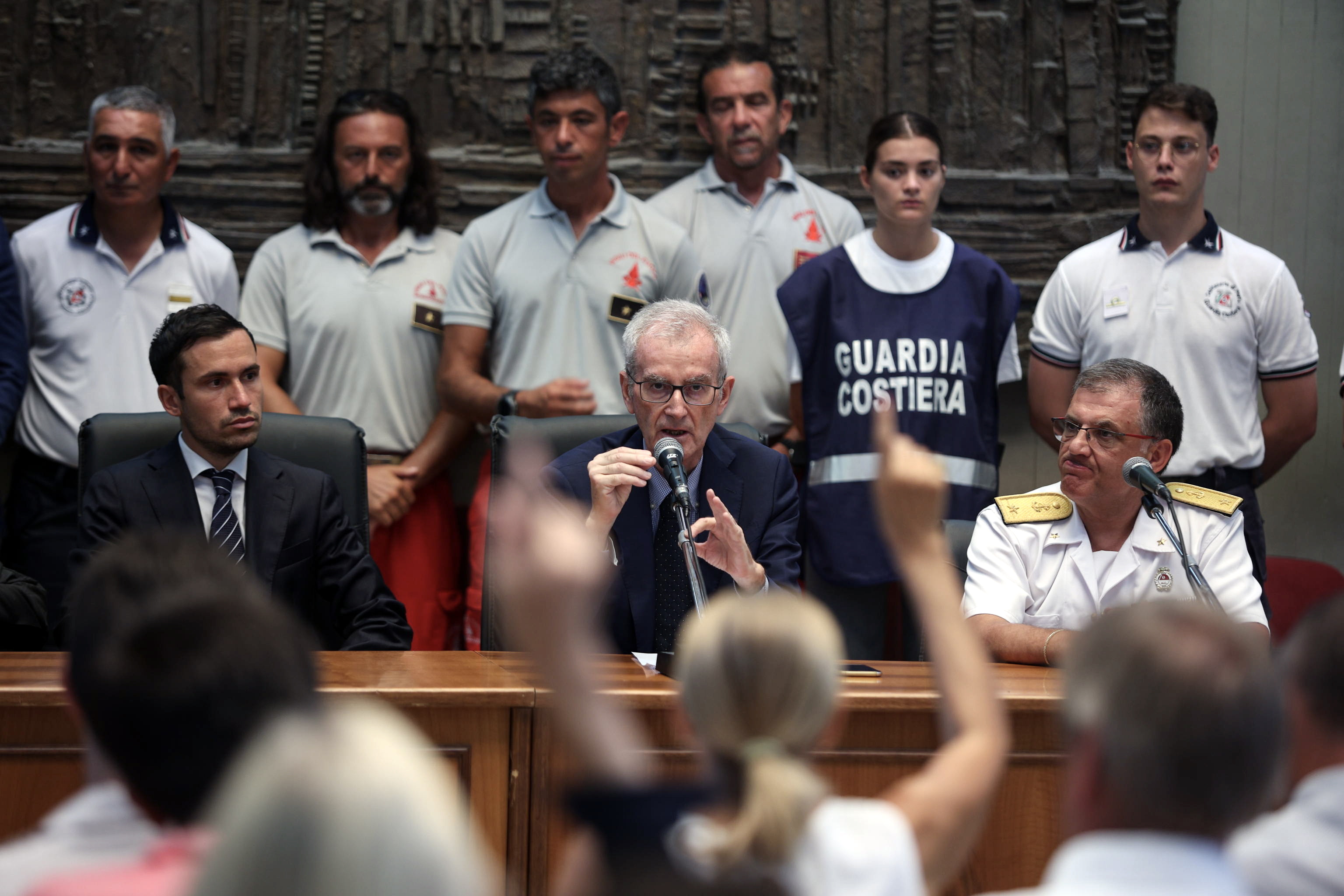 Chief prosecutor Ambrogio Cartosio (L) speaks next to Rear Admiral Raffaele Macauda at a press conference